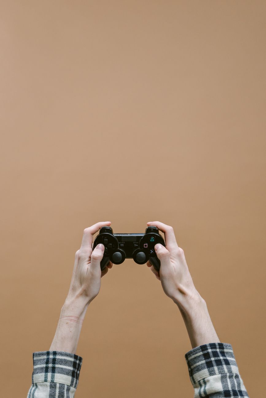Hands holding a game controller